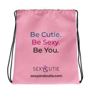 Samarreta rosa amb missatge "Be Cutie. Be Sexy. Be You." per a dones.