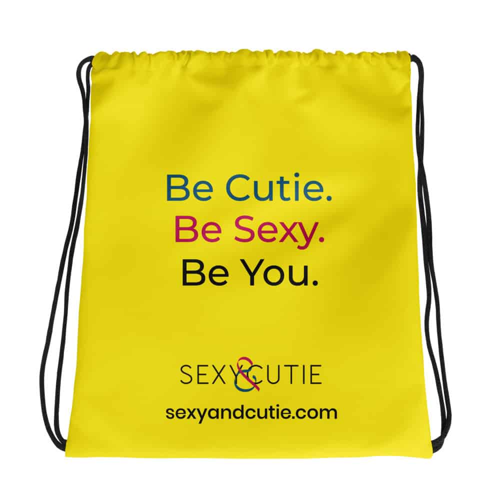 Bossa amb missatge "Be Cutie. Be Sexy. Be You." en colors vibrants.