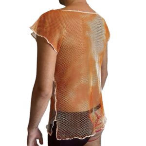 Woman wearing orange mesh top and shorts on white background.