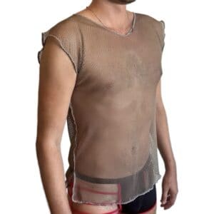 Woman wearing a sheer mesh top and athletic shorts.