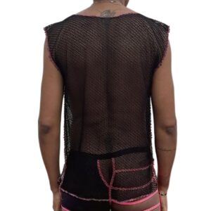 Woman wearing a black mesh top and pink shorts, seen from behind.