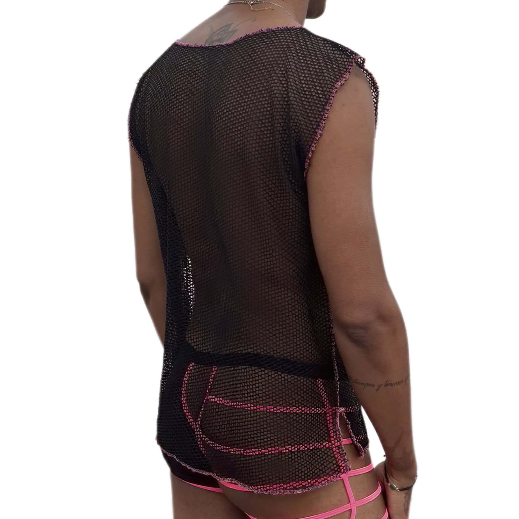 Woman wearing black lace clothing with pink details, back view.